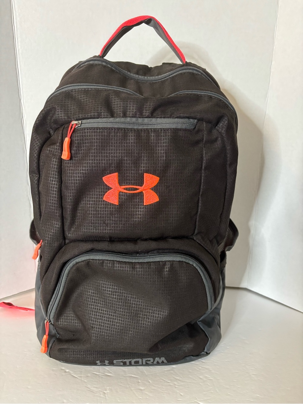 Under Armour Black Backpack with Bright Orange Logo and Accents